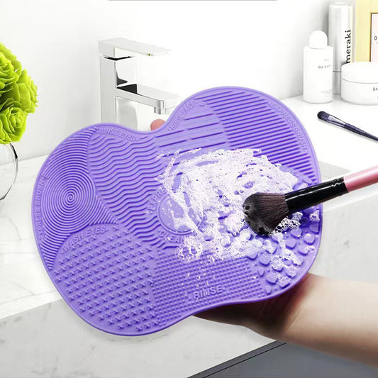 Makeup brush cleaning pad